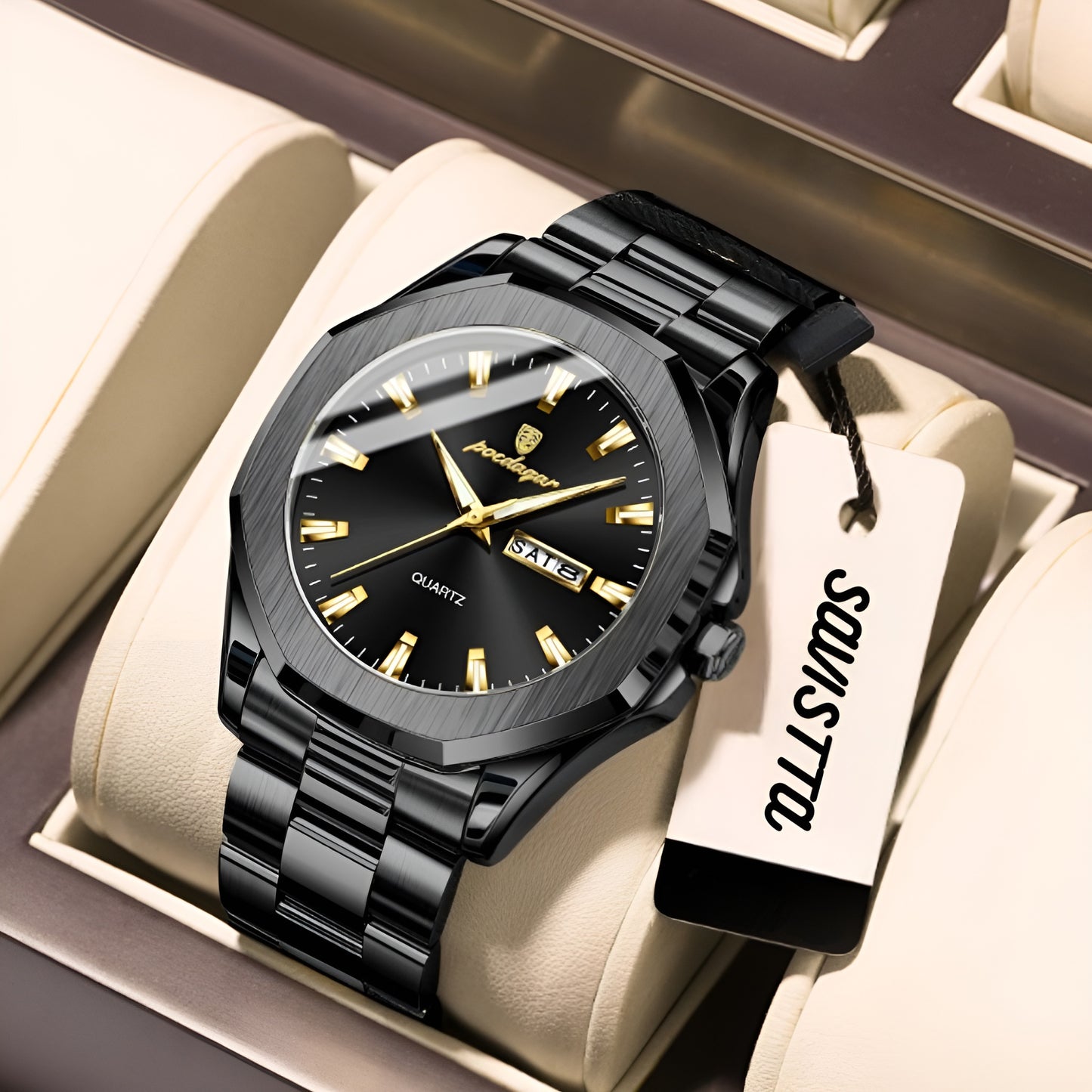 Black watch with gold accents on a beige cushion, branded 'Poedagar'.