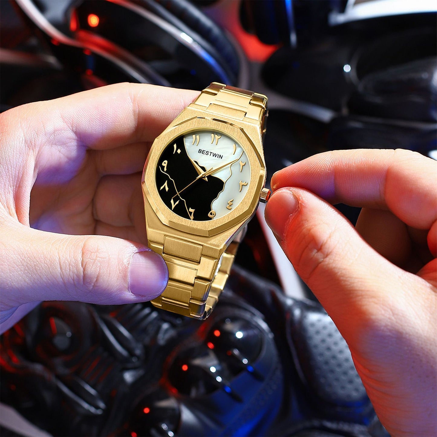 Gold wristwatch held by a hand with a blurred car interior background