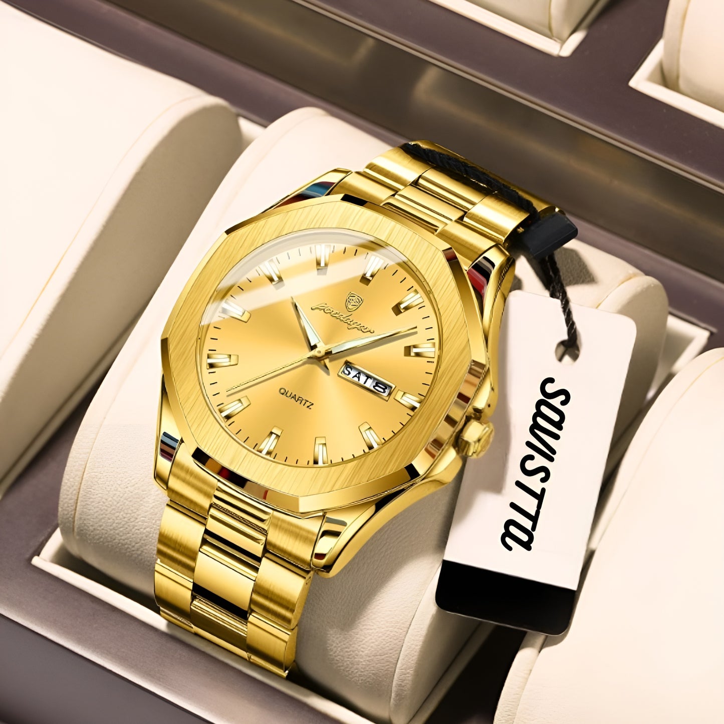 Gold watch with a visible brand tag on a white cushion