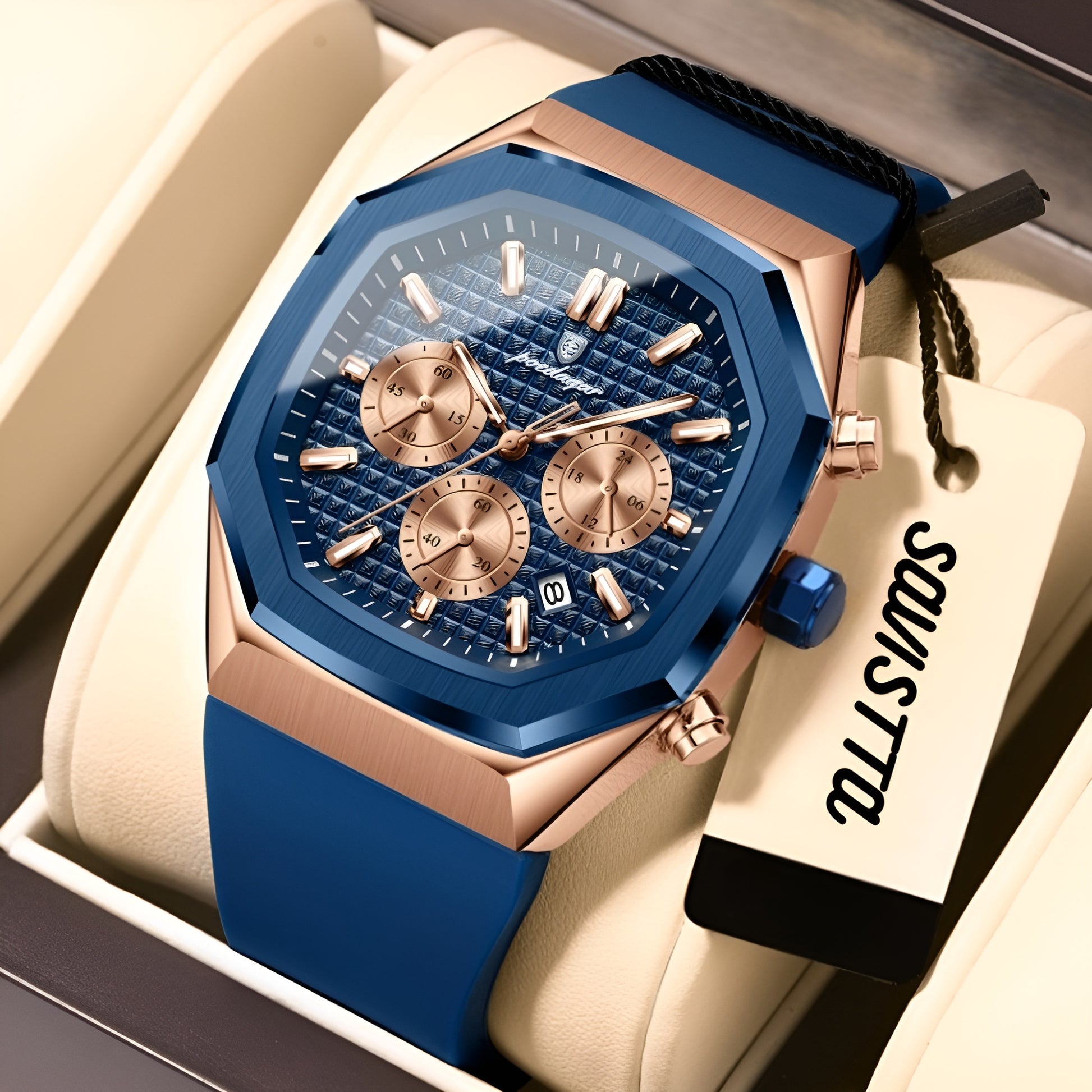 Luxury watch with blue and rose gold design on a beige cushion, brand tag visible