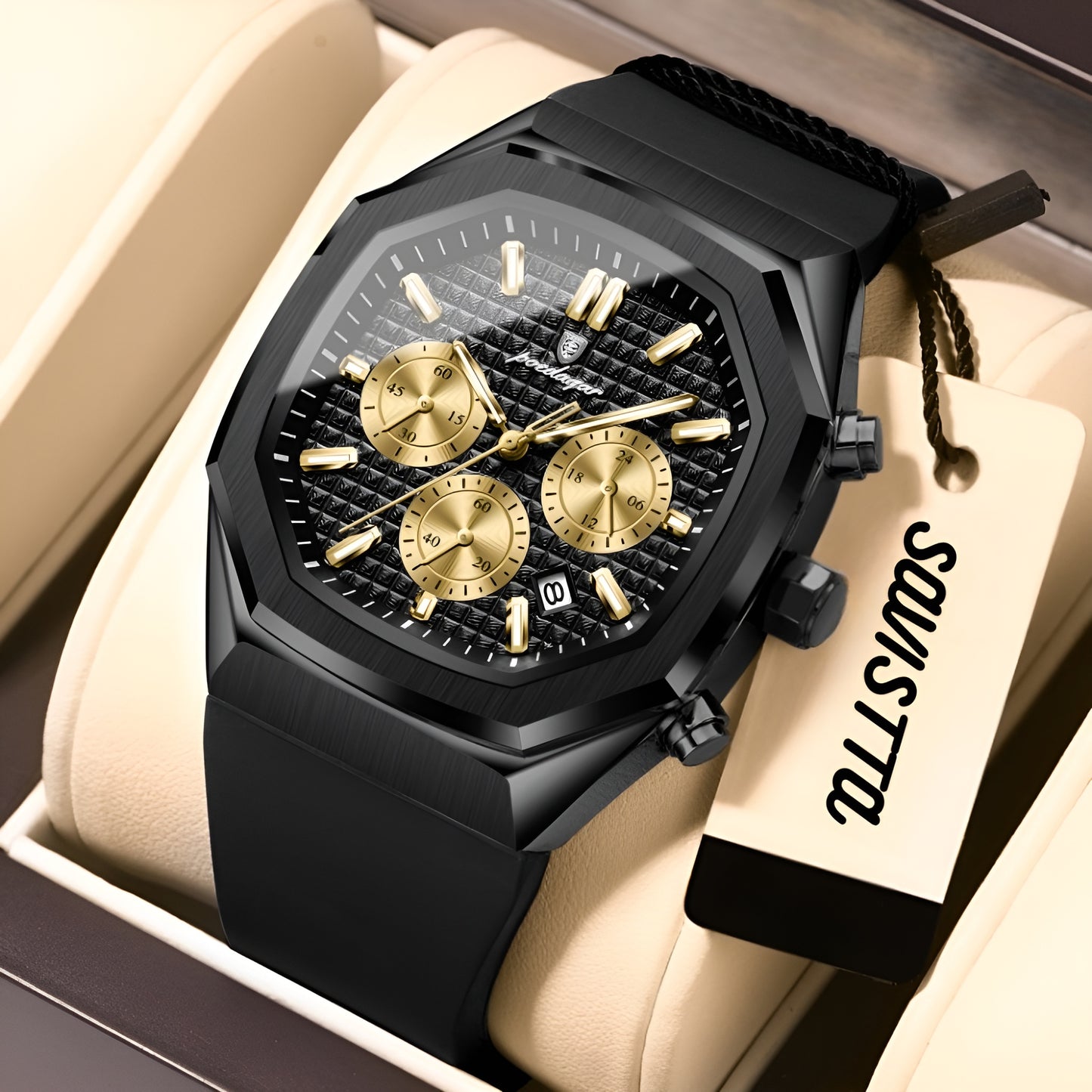 Black and gold watch with a brand tag on a beige cushion